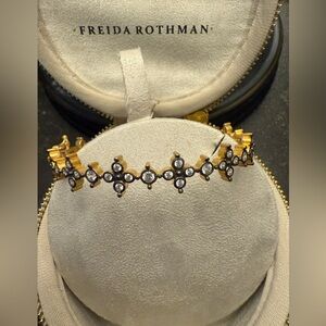 Freida Rothman Gold-Tone Crystal Floral Bracelet - Elegant Sparkle